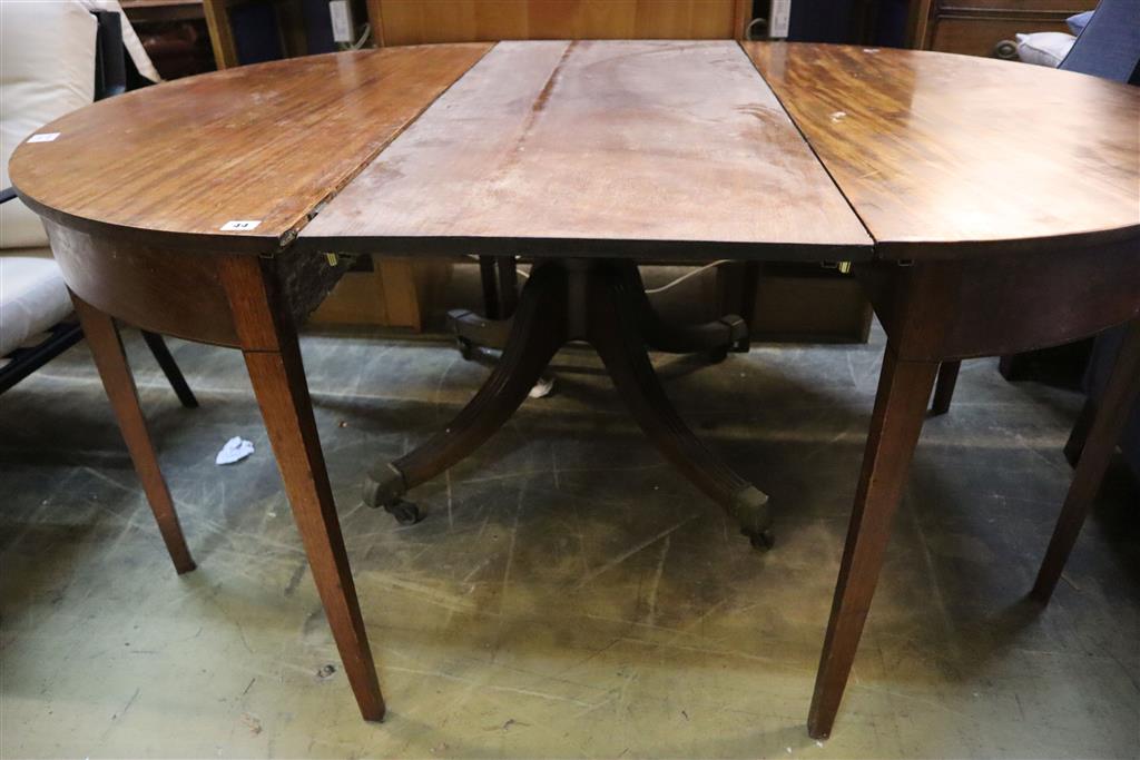 A George III mahogany D end extending dining table, width 164cm, depth 114cm, height 72cm